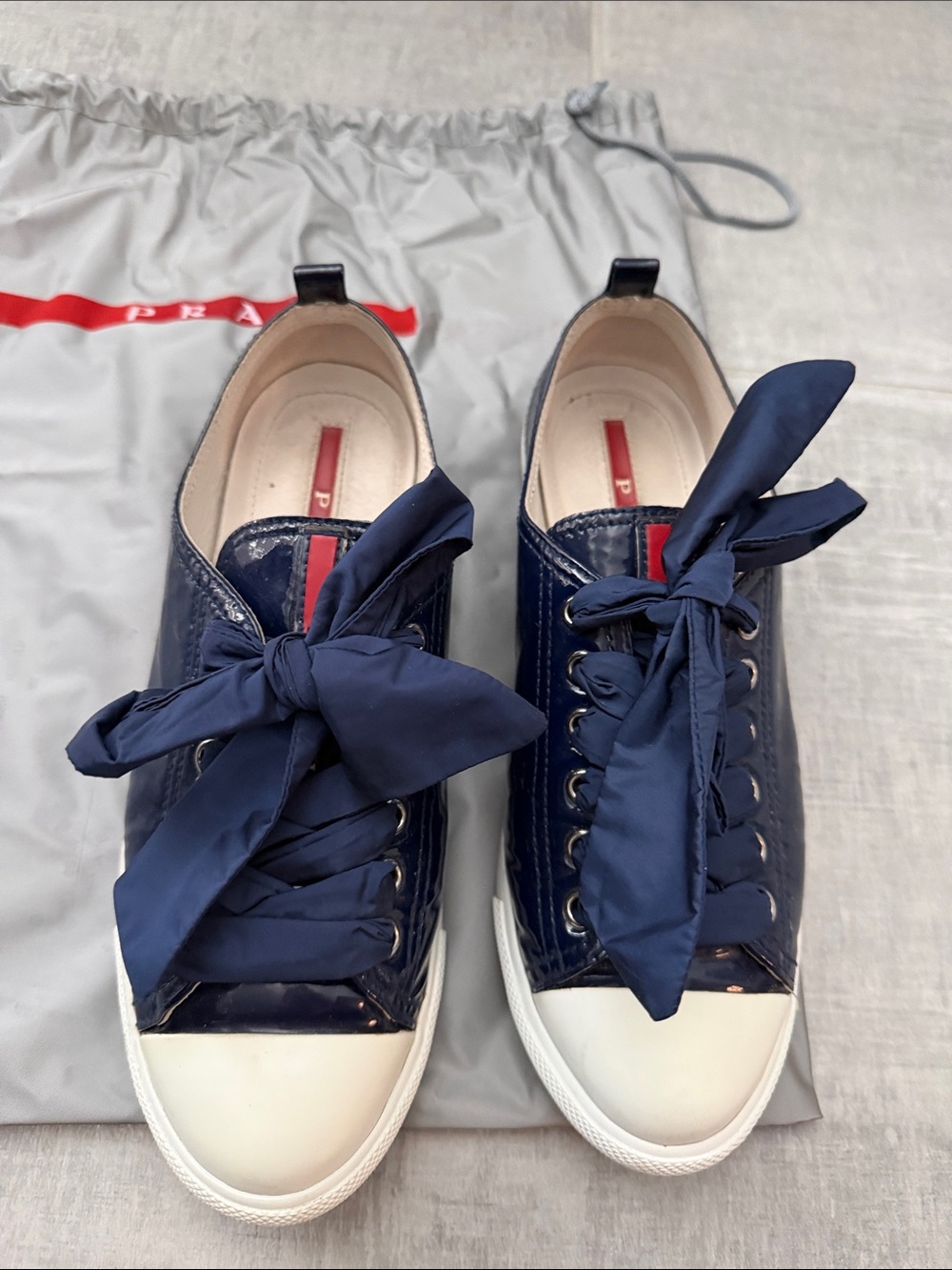 Prada Navy Patent Bow Lace-Up Sneakers with Cream Toe Cap